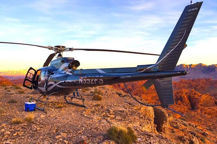 Experience breathtaking views from a helicopter as you soar over majestic canyons and enjoy a sunset landing at Valley of Fire complete with a delightful Champagne toast.